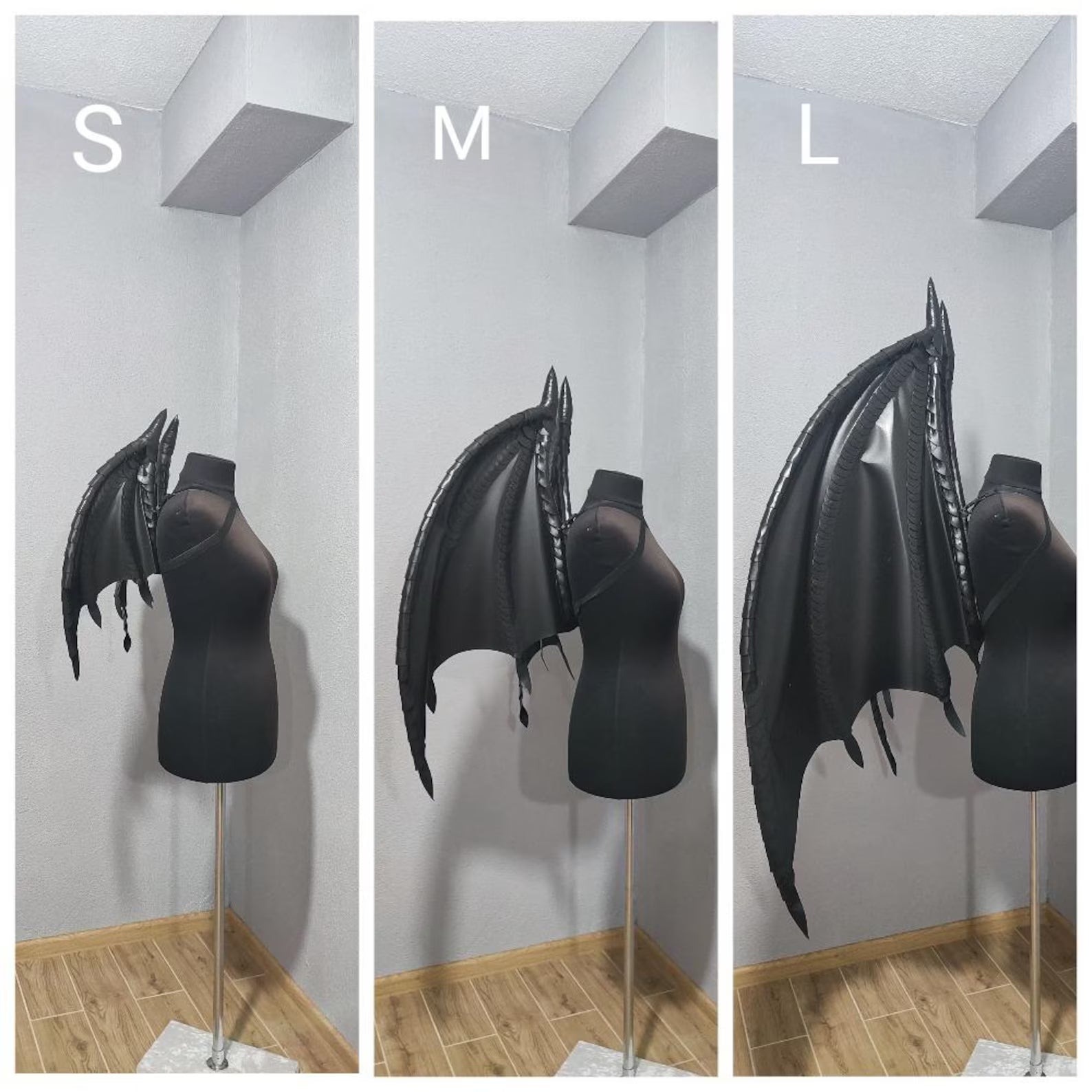 Black winged costume on mannequins labeled S, M, and L against a plain background.