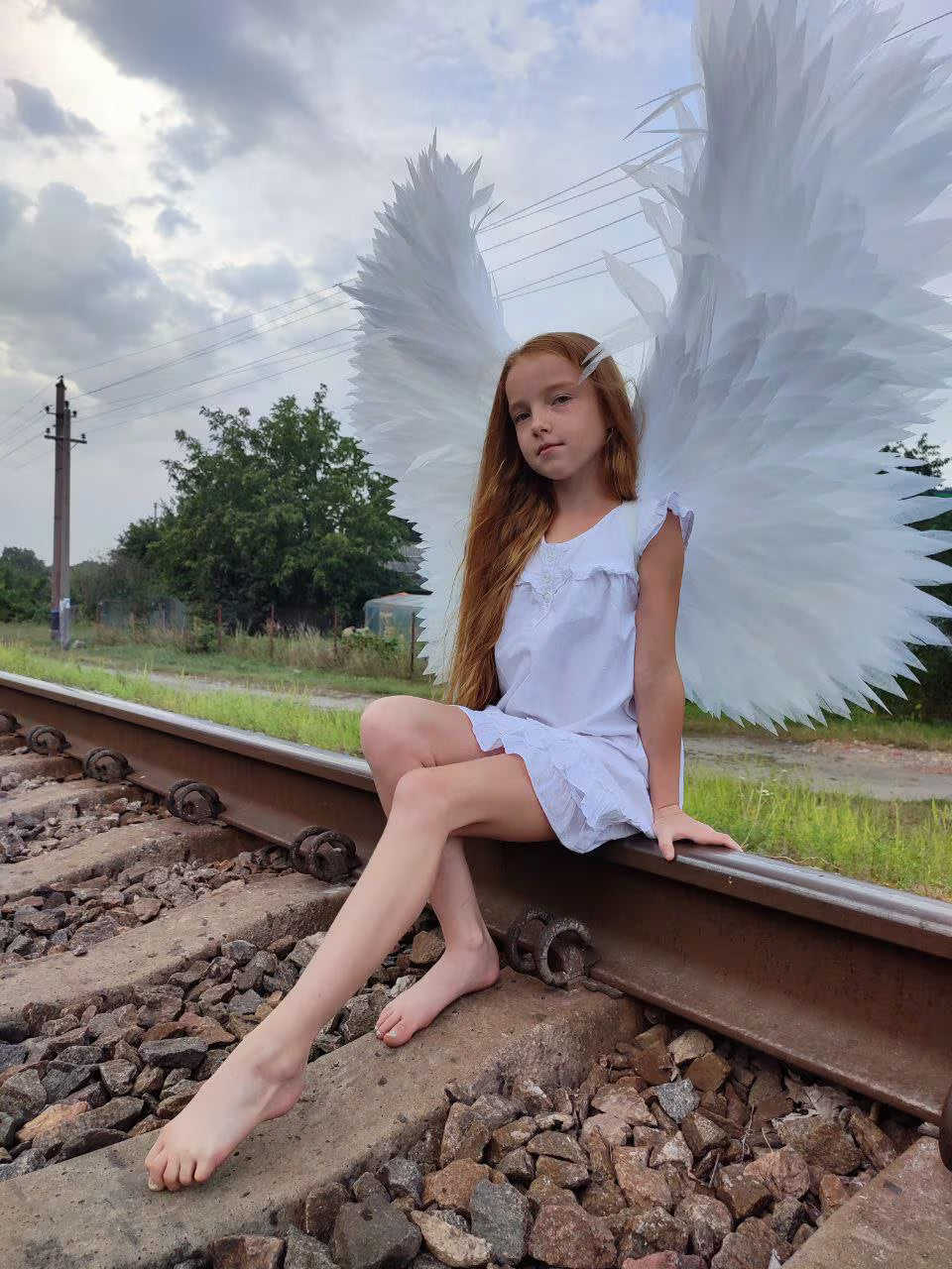 Lightweight white angel wings with handcrafted foam feathers for Christmas pageants, First Communion, and theatre performances